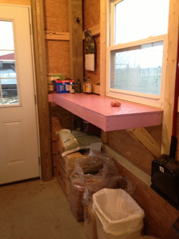 Another view of the feed room. I use pine and cedar chip for the coop floor. It's easier than raking up straw and of course the pine and cedar smell so good.